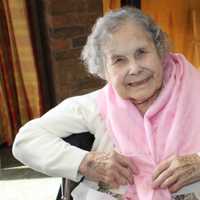 <p>A Waveny LifeCare Network patient shows off her new scarf.</p>