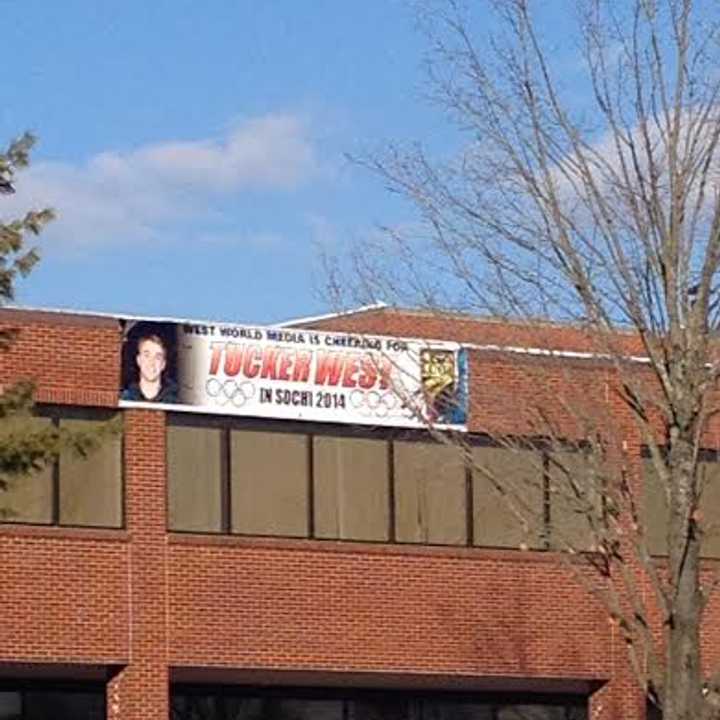 A sign supporting Tucker West is the side of the Pamby Motors building on Danbury Road in Ridgefield opposite the Stop &amp; Shop. 