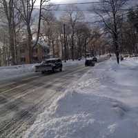 <p>Roads are covered with snow Friday morning in Ridgefield after the overnight storm. </p>