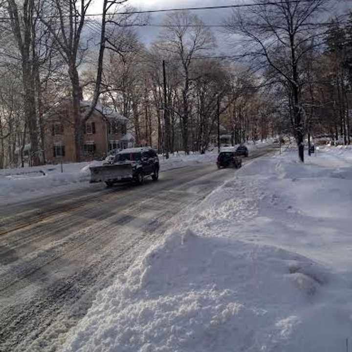 Roads are covered with snow Friday morning in Ridgefield after the overnight storm. 