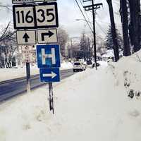 <p>Snow is piling up along the sides and shoulders of roads in Ridgefield from the relentless storms. </p>