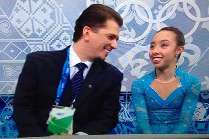 Brooklee Han, right, and her coach, Serhii Vaypan, wait for scores in the kiss and cry after Wednesday&#x27;s short program at the Olympics in Sochi.