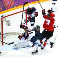 <p>Marie-Philip Poulin celebrates after scoring a goal late in regulation for Canada to force overtime in Thursday&#x27;s gold medal game against the United States.</p>