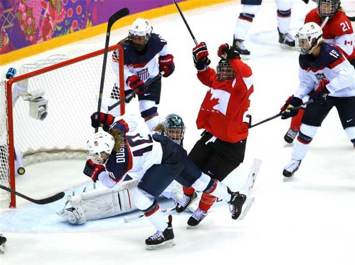 Marie-Philip Poulin celebrates after scoring a goal late in regulation for Canada to force overtime in Thursday&#x27;s gold medal game against the United States.