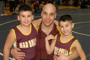 Norwalk's Singer Brothers Sew Up State Wrestling Titles