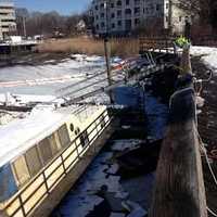 <p>This is the scene near the sunken houseboat in East Norwalk. </p>