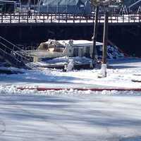 <p>The Norwalk River is mostly iced over near the Oyster Bend Marina where the houseboat sank. </p>