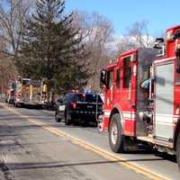 <p>Multiple fire crews respond to a two-alarm blaze at the Goldens Bridge Fire Station on Monday morning.</p>