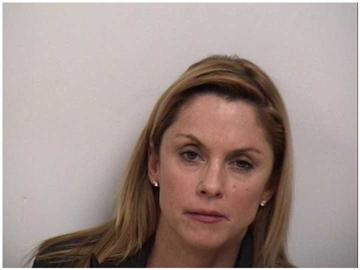 Stacy Flanagan of Fairfield is accused of stealing money from tip jars at a Westport restaurant in front of two children.