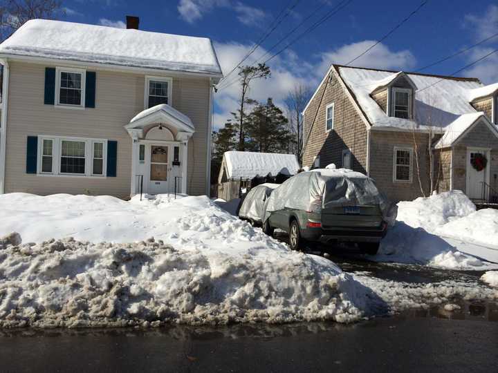 A clever, quick way for commuters in Fairfield County to clean off their cars before going to work. 