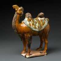 <p>Several ceramic Bactrian camels were part of the gift the Brooks family gave to the Bruce Museum. </p>