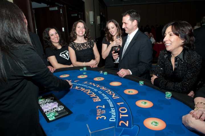 Share the Love attendees enjoying the BlackJack table. From Left to Right: Christina DiMase, Debi Fossati, Jennifer Larkin, Christopher Larkin and Sandra Fink.