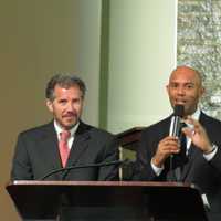 <p>Mariano Rivera presents New Rochelle City Manager Charles Strong with a Companion Bible.</p>