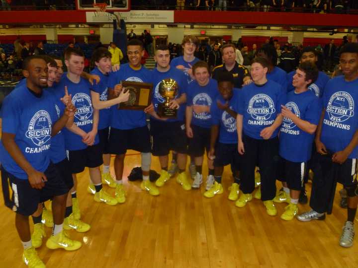 The Walter Panas boys basketball team, seen here with their Section 1 championship trophy, fell to Red Hook in the Class A state regional final in Beacon.