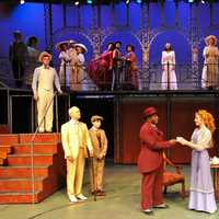 <p>Left to right, Todd Ritch, on steps, (as Younger Brother), Grant Albright (as The Little Boy), Fataye (as Coalhouse Walker), Victoria Lauzun (as Mother), Craig Waletzko (as Father) and the ensemble perform &quot;New Music.&quot;</p>