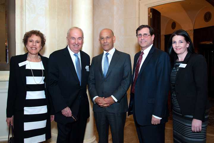 At the reception Thursday for Montefiore were, from left, Amy Allen, Bill Mooney, WCA; Dr. Steven Safyer, Jeffrey Menkes, Montefiore; and Marissa Brett, WCA. 