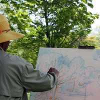 <p>Dmitri Wright paints en plein air at Weir Farm National Historic Site in Wilton and Ridgefield.</p>