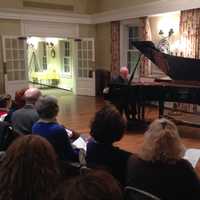 <p>Northern Westchester residents listen intently as Vladimir Feltsman performs at the second-to-last Bedford Chamber Concert Series of the 2013-14 season. </p>