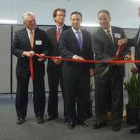 <p>Norwalk officials, state officials and Cervalis representatives cut the ribbon on the new data center in Norwalk.</p>