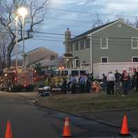 <p>Hazmat and fire crews set up near a neighbor&#x27;s house on Clinton Street in Fairfield on Monday evening. </p>