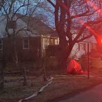 <p>Hazmat and fire crews set up near a house on Clinton Street near Oyster Road in Fairfield on Monday evening. </p>