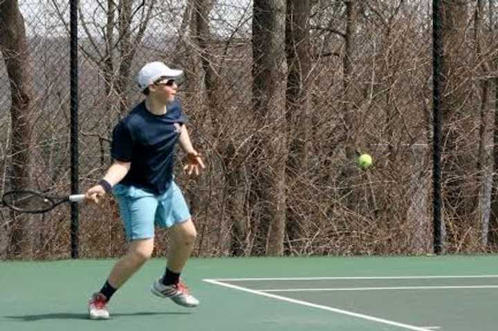 Alec Roslin of Armonk won a singles match for Harvey in a 7-2 win over Watkinson.