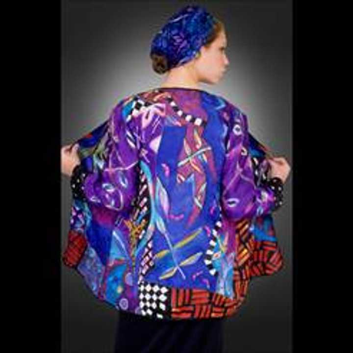 Heather Kidson of Westwood, Mass., will show off her handpainted silk items, such as this jacket, at the Bruce Museum Outdoor Crafts Festival. 