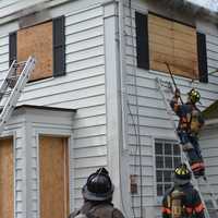 <p>Firefighters practice at a New Castle home.</p>