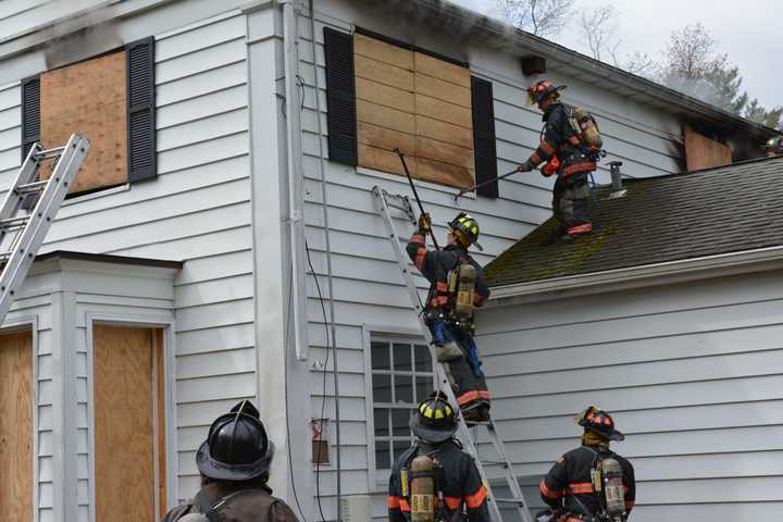 Firefighters Practice With New Castle House Offered For Use By Owner