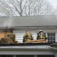 <p>Firefighters are positioned for training at a New Castle home. </p>