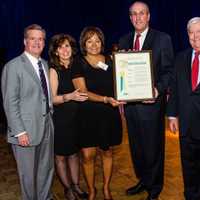 <p>Deputy Westchester County Executive Kevin Plunkett, center, presents a proclamation at the gala. Others in the photo, from left, are Edward Foley, Elaina Mango, Susan B. Wayne, Kevin Plunkett, Douglas McClintock and Howard Greenberg.</p>