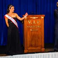 <p>Special guest Jennifer Czarniecki, Mrs. Westchester County 2014, helps auctioneer Michael Weissman during the live auction.</p>