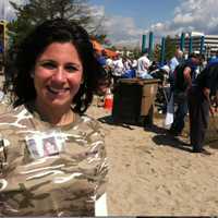 <p>Gina Aiello, of Stamford, the local organizer to build a playground in honor of Jesse Lewis one of the 26 students and staff killed at Sandy Hook Elementary School in 2012. The playground was built Friday and the ribbon cutting will be11 a.m. Sunday.</p>