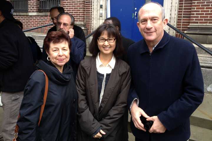 Ann Silver, left, helped broker the deal that led to the purchase of the former Yonkers Jail to Maya Lin, center, and Daniel Wolf.