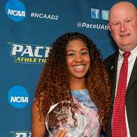 <p> Darrell Halloran Memorial Award Recipient Kaitlyn Lynch and Director of Athletics Mark Brown.</p>