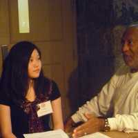 <p>Cosby gives Eula Beck some advice before her speech.</p>