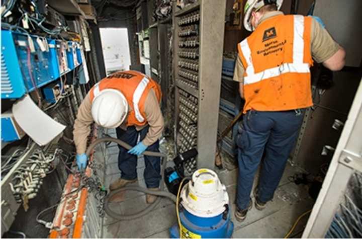 Metro-North workers repair the Greenwich switch control house.