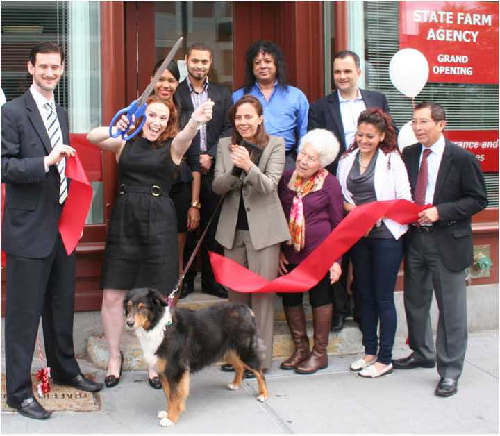 Yonkers officials and State Farm employees celebrate the opening of the insurance company&#x27;s new location -- and a donation to local animal shelters.