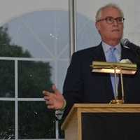 <p>Bill Harrington makes acceptance remarks from the podium.</p>