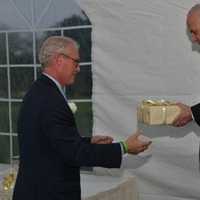 <p>William P. Harrington, chairman, Westchester County Association, accepts the Community Leadership Award from Lou Nemnon.</p>