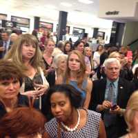 <p>An anxious crowd waits for the cooking demo to begin.</p>