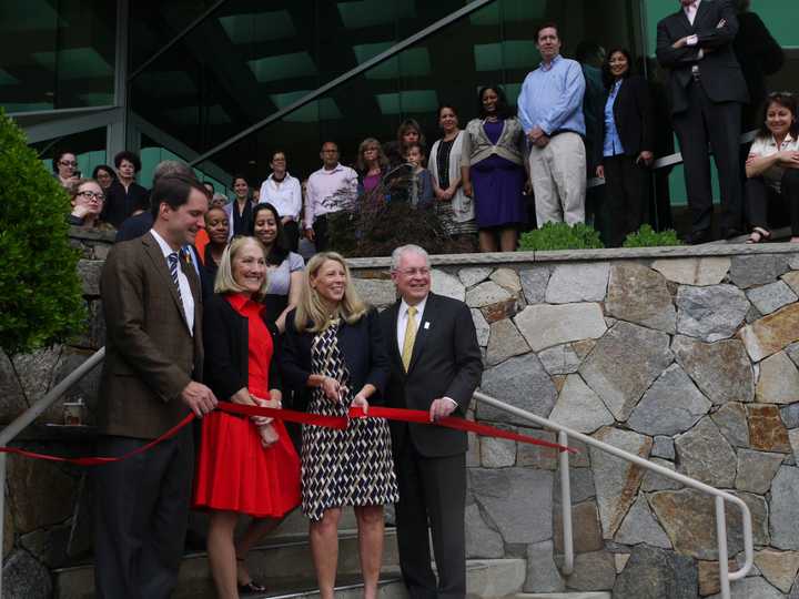 Fairfield First Selectman Michael Tetreau, along with U.S. Rep. Jim Himes, welcomes Save the Children CEO Carolyn Miles and Board of Trustees Chairwoman Anne Mulcahy to Fairfield with a ribbon-cutting Monday morning. 