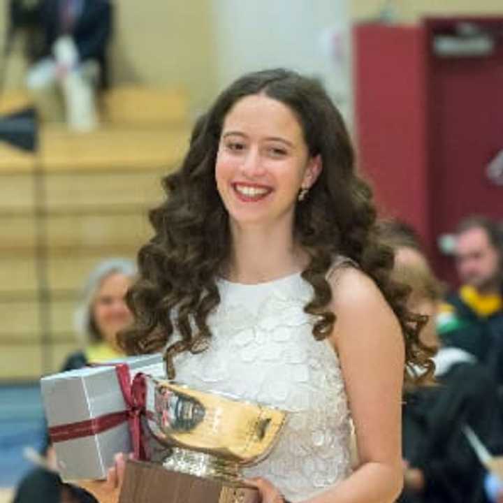 Emily Silk of Greenwich is presented with five major awards at the commencement exercises at the Harvey School. 