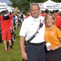 <p>New Canaan Fire Department Capt. Mike Socci with Kathy Giusti</p>