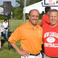 <p>Paul Giusti with New Canaan football coach Lou Marinelli. </p>