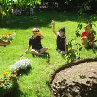 <p>Students work together to beautify the grounds. </p>