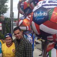 <p>From left, Anthony Melendez, of Peekskill, T.J. Ribeiro, of Tarrytown, and Jason Khoder, of Tarrytown watch the World Cup in Port Chester. </p>