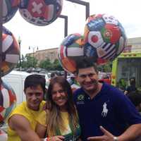 <p>From left, Niomar Silva, of Greenwich, Camilla Prado, of Stamford, and Rochester Sousa, of Stamford, watch the World Cup in Port Chester. </p>