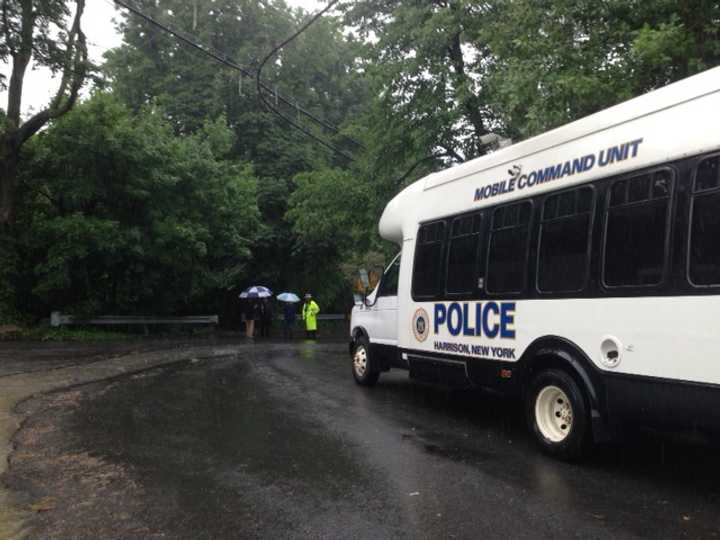 A Harrison Police mobile unit stationed at Cottage Avenue in Purchase near the scene of the fatal plane crash Friday morning.