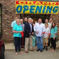 <p>Westwood Flooring &amp; Design Center employees celebrate the business&#x27; grand opening in Wilton.</p>